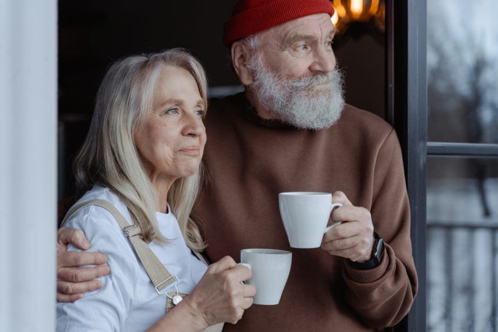 Couple looking out of the window